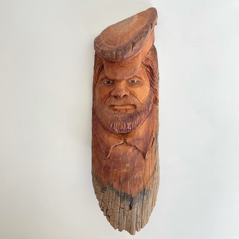 Vintage hand carved wooden Seaman sculpture by artist Dale Hallett.